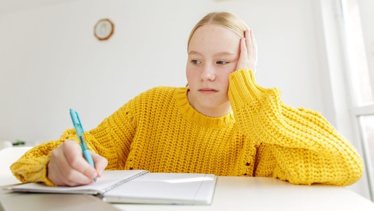 a student with Dysgraphia struggling with writing